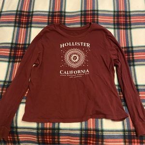 Maroon Hollister long sleeve with a sun design